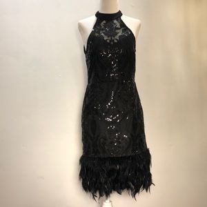 Lace, sequence and feather dress. LBD